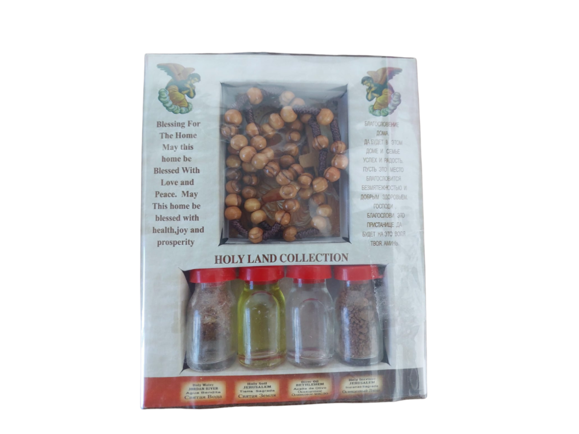 Holy Land Collection gift set containing holy water, olive oil, soil, and incense in glass bottles with a wooden rosary and home blessing prayer from Jerusalem.