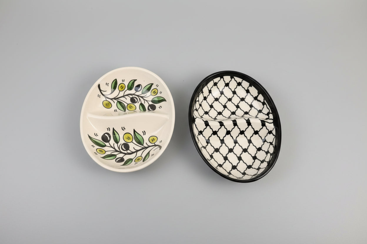 Two ceramic plates with decorative patterns on a gray surface