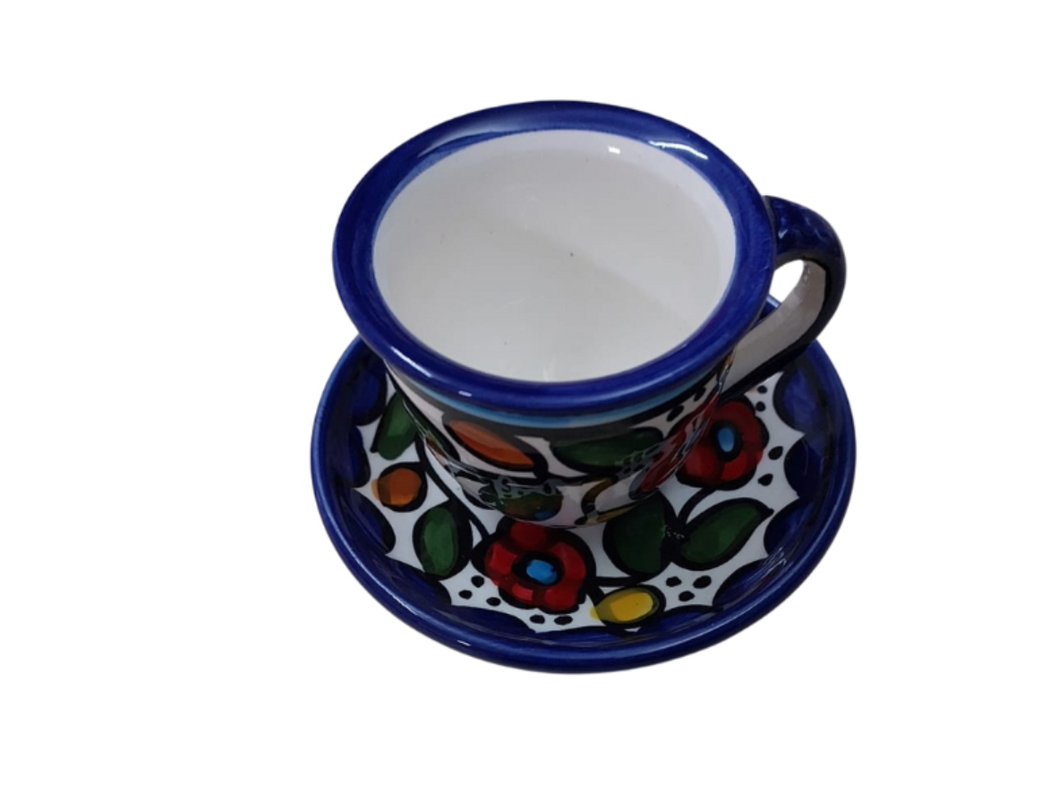 Ceramic cup and saucer with floral design 