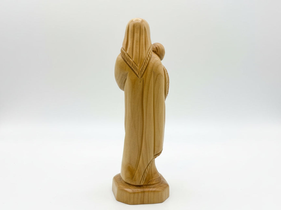 Hand-carved Mother Mary statue made from authentic Holy Land olive wood. A unique, spiritual decor piece perfect for home, church, or gifting.