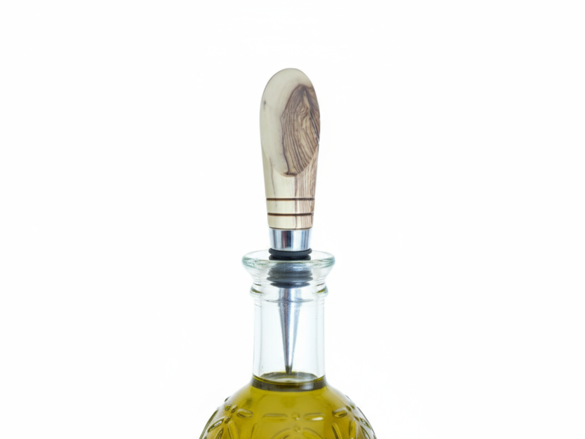Handcrafted olive wood wine bottle stopper with stainless steel and black rubber seals