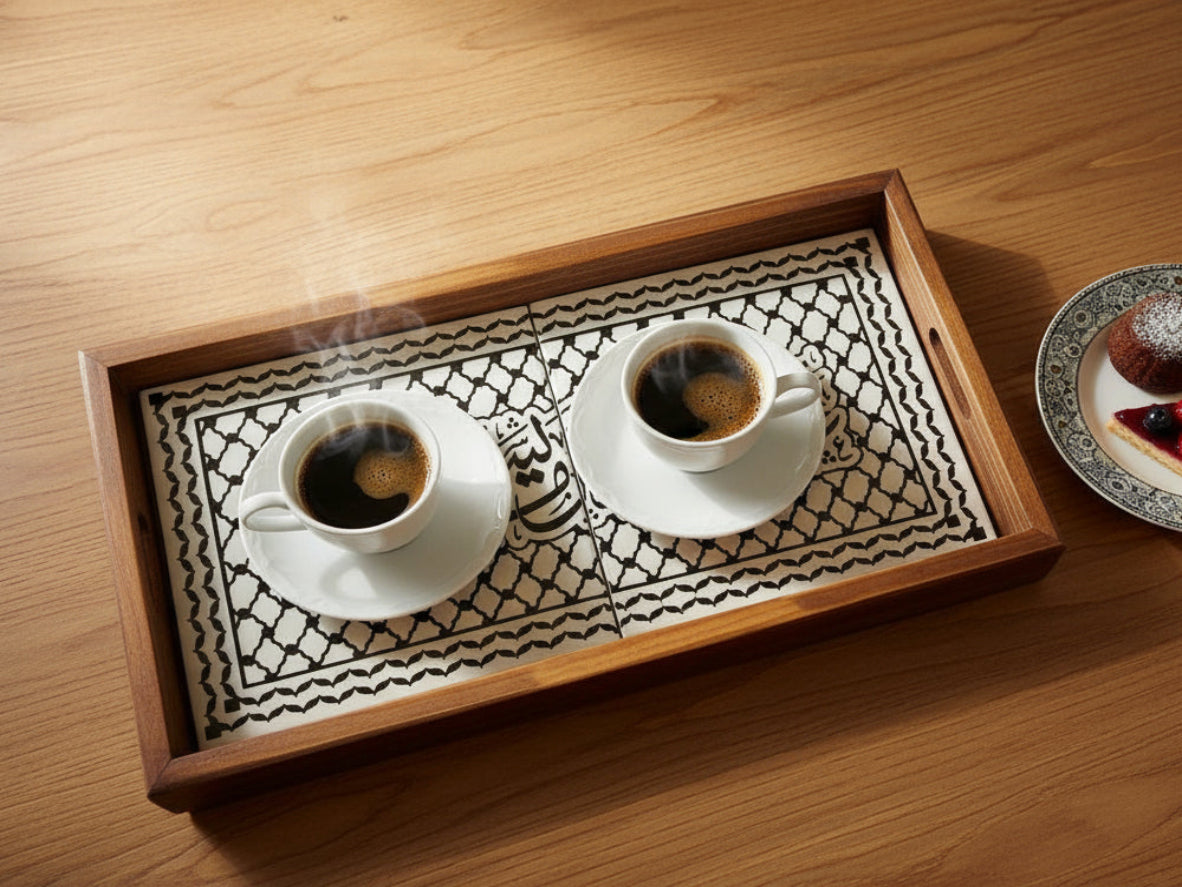 Decorative tray with Arabic calligraphy design on a light background