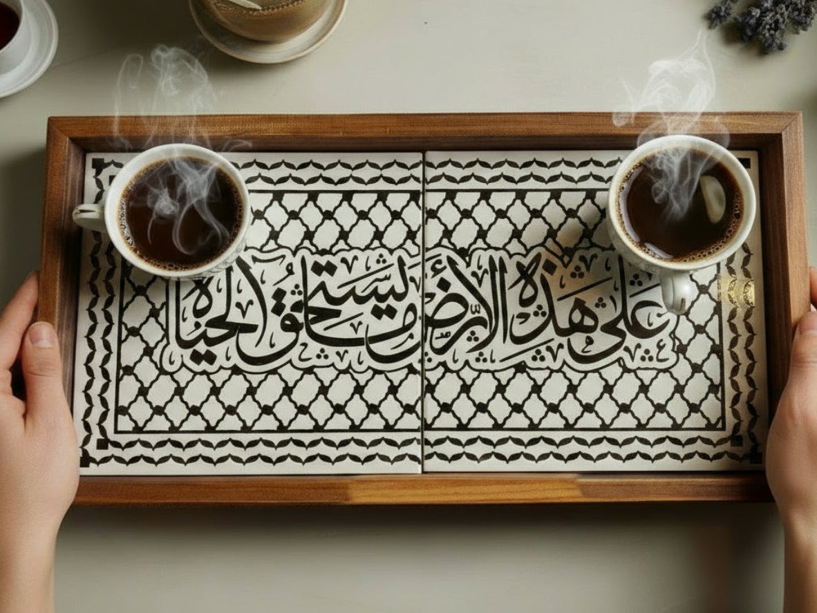 Handcrafted rectangular ceramic serving tray with Arabic calligraphy and traditional black-and-white Kuffiyeh pattern framed in olive wood, made in Hebron Palestine