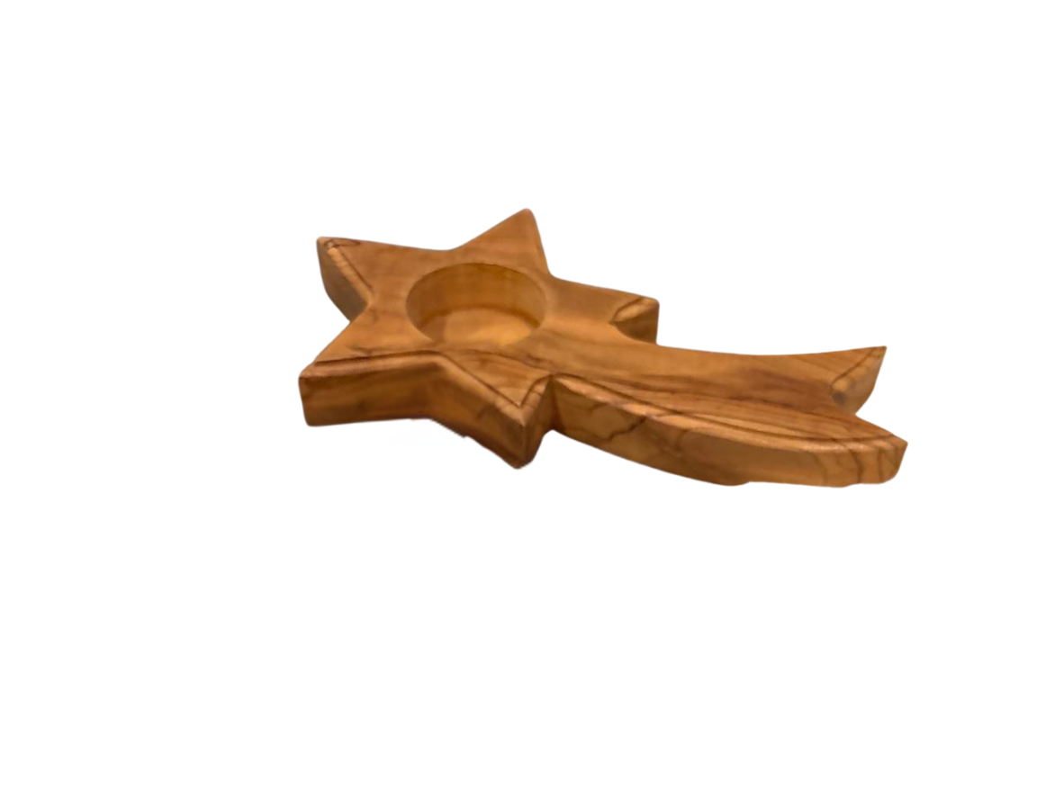 Handcrafted olive wood shooting star candle holders made in Bethlehem, Palestine, featuring natural wood grain and space for a tealight candle.