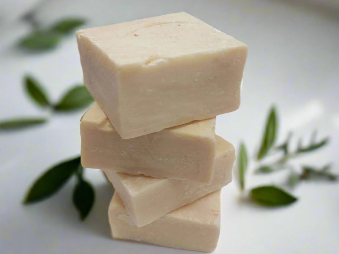 Natural olive oil soap bar with creamy texture, perfect for sensitive and dry skin