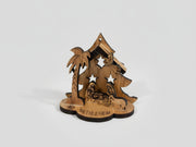 Wooden nativity scene with 'Bethlehem' sign on a wooden surface