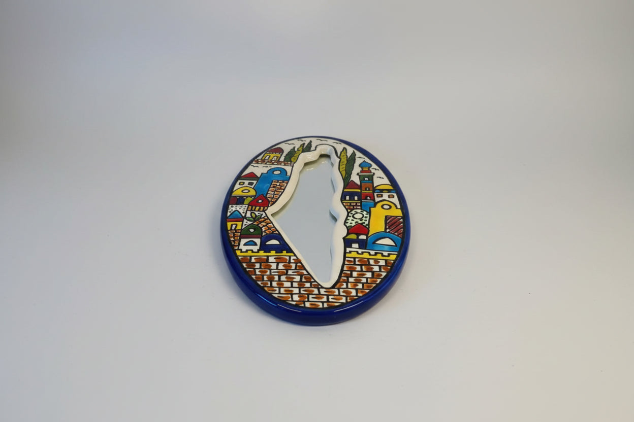 Decorative wall art with colorful abstract designs on a white background